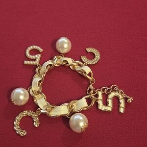 Elegant Gold and White Charm Bracelet